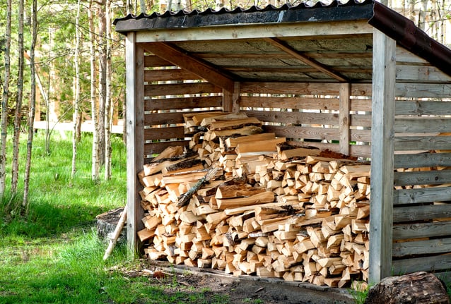 Firewood stored in an airy chalkboard